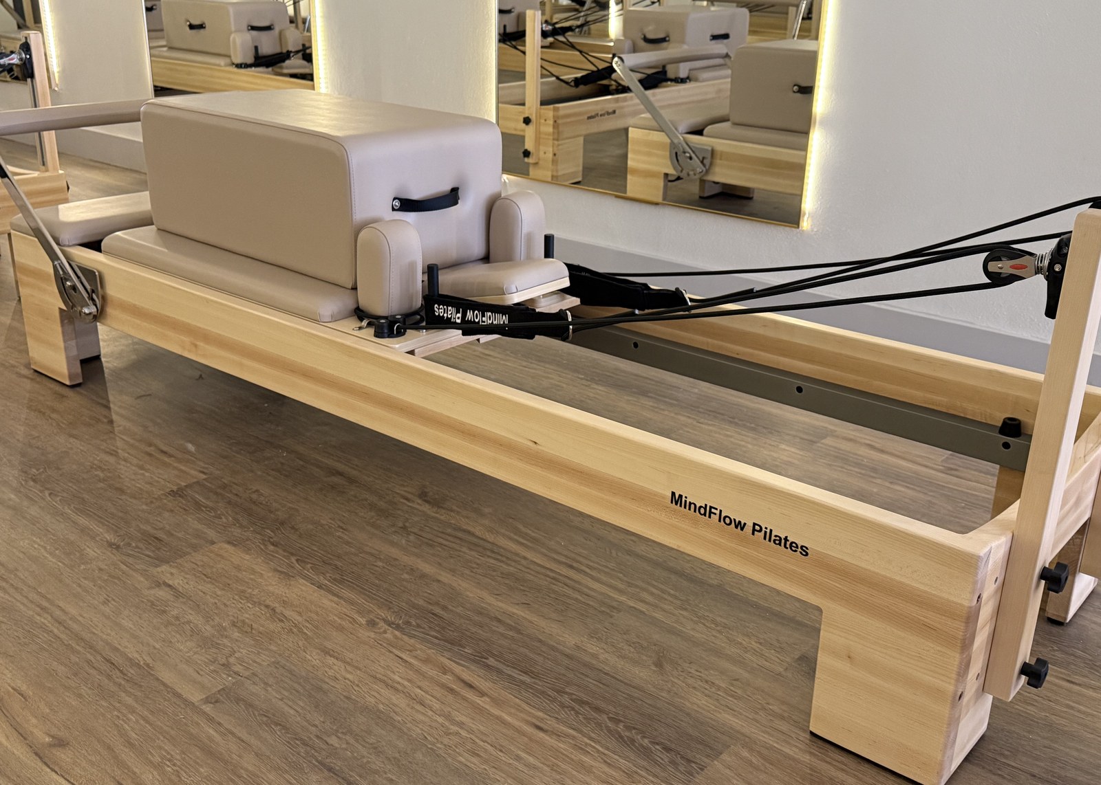 MindFlow Pilates branded reformer in the Winter Haven studio